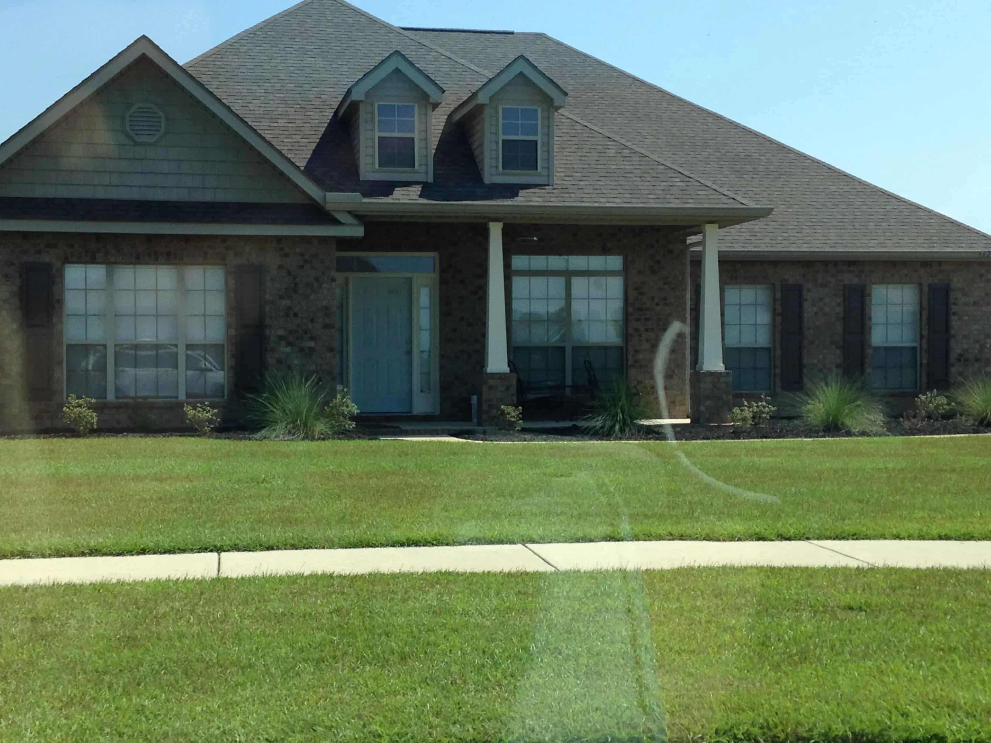 painting the door blue for a modern farmhouse style