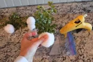 decorating the sugar mold with greenery 