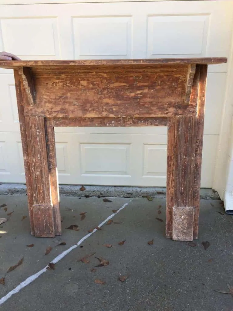 antique mantel after paint is stripped 