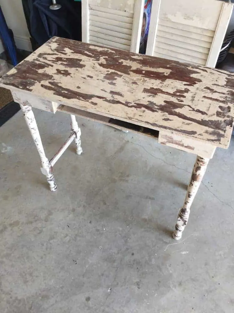 vintage desk makeover after stripping the top layer of paint off