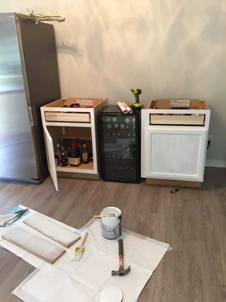 painting the DIY beverage bar and coffee bar