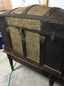 antique steamer trunk with new wood base