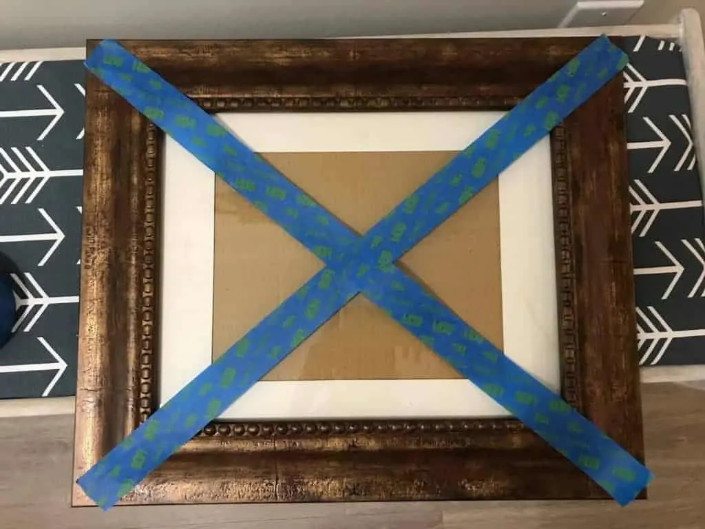use painters tape to find center of frame 