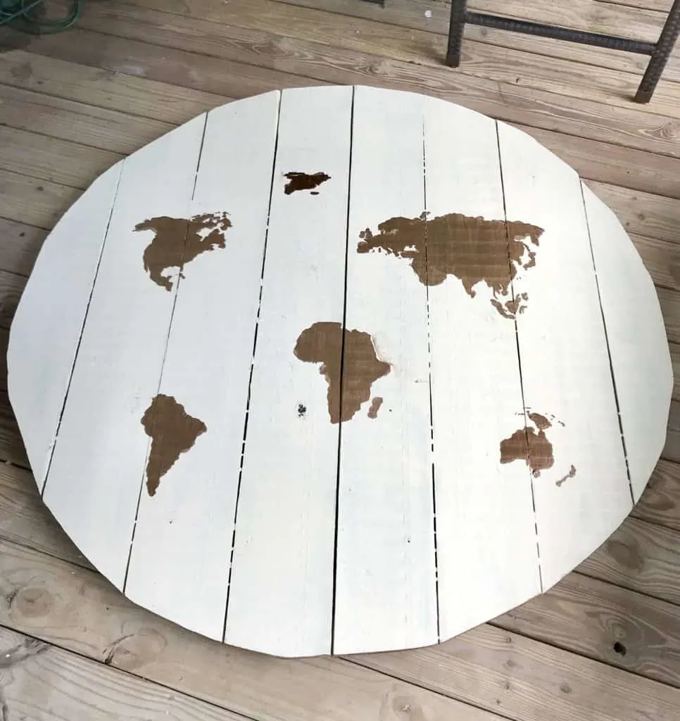 table top with painted world stencil 