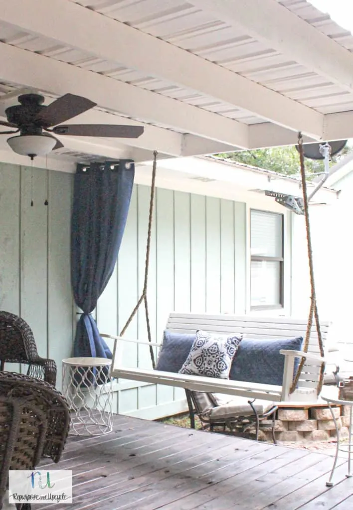 Hanging indoor curtains outside and without drilling holes