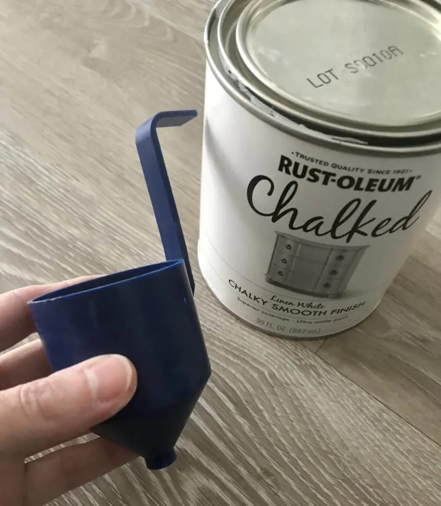 cup that tests the viscosity of the chalk paint for the paint sprayer