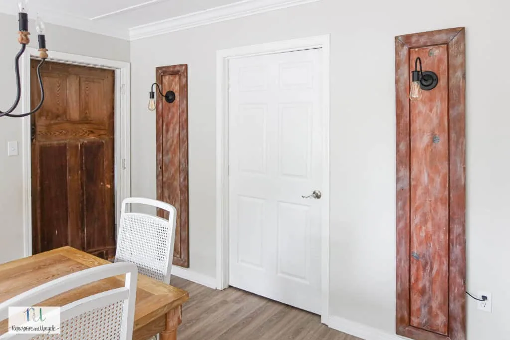 repurposed doors with light sconces