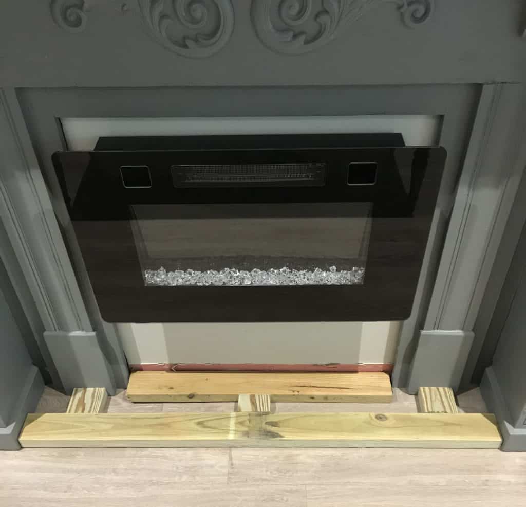 building the base for the DIY raised electric fireplace hearth