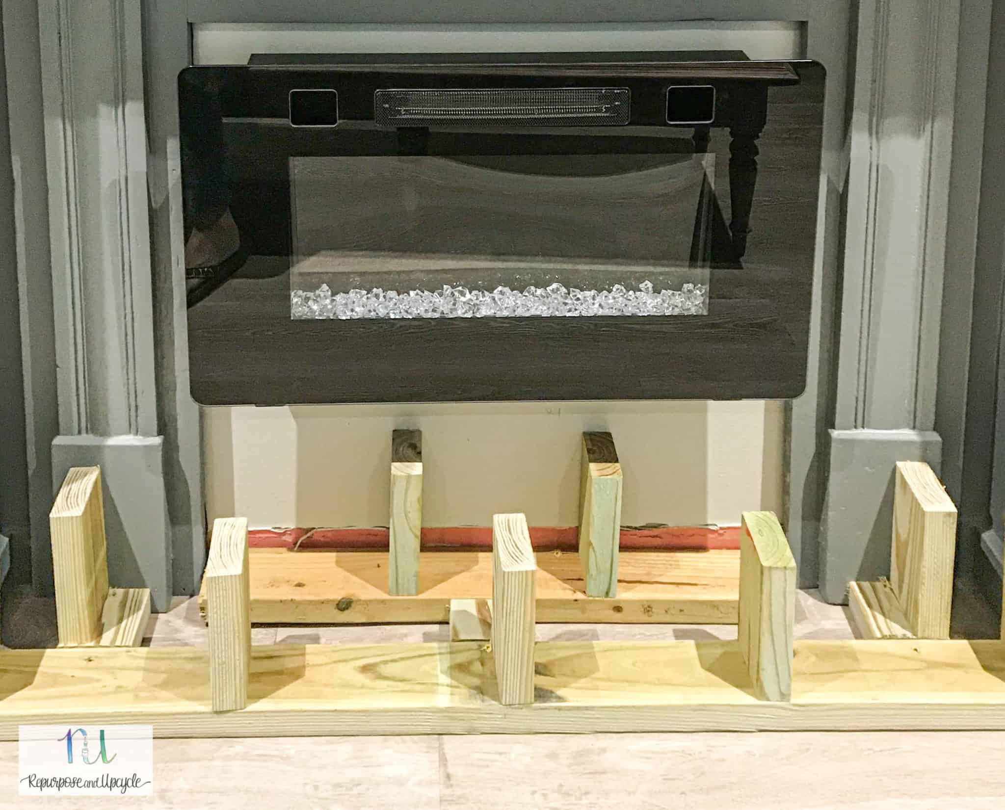 Our New DIY Raised Electric Fireplace Hearth with Stone