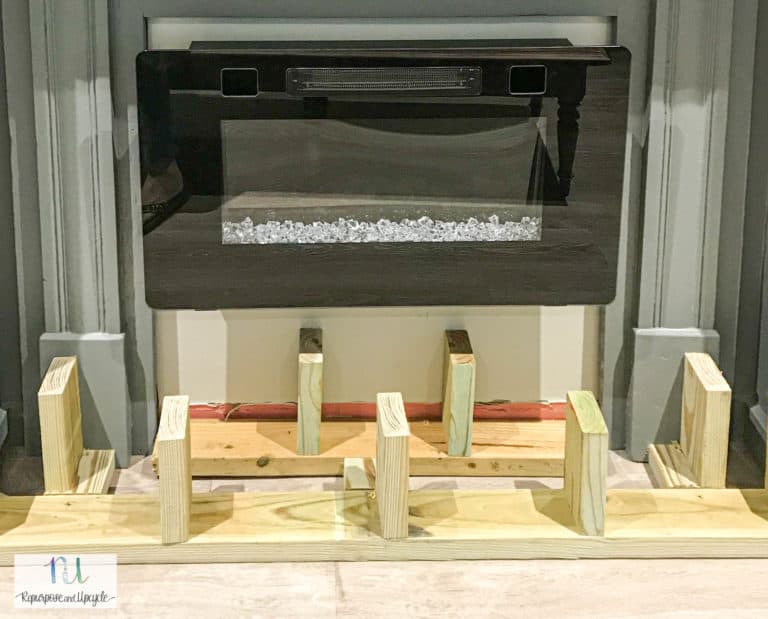 Our New DIY Raised Electric Fireplace Hearth with Stone