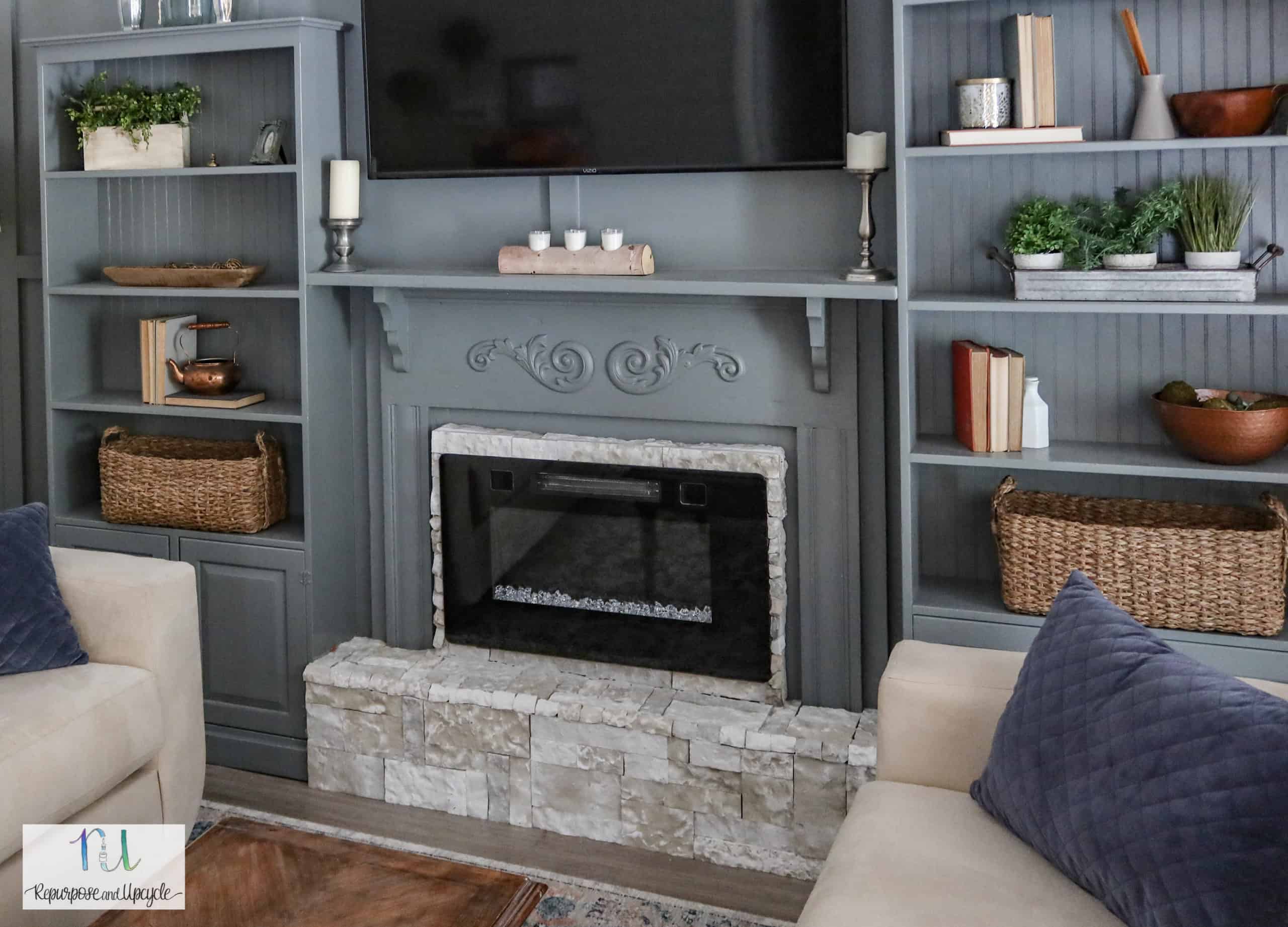 Our New DIY Raised Electric Fireplace Hearth with Stone