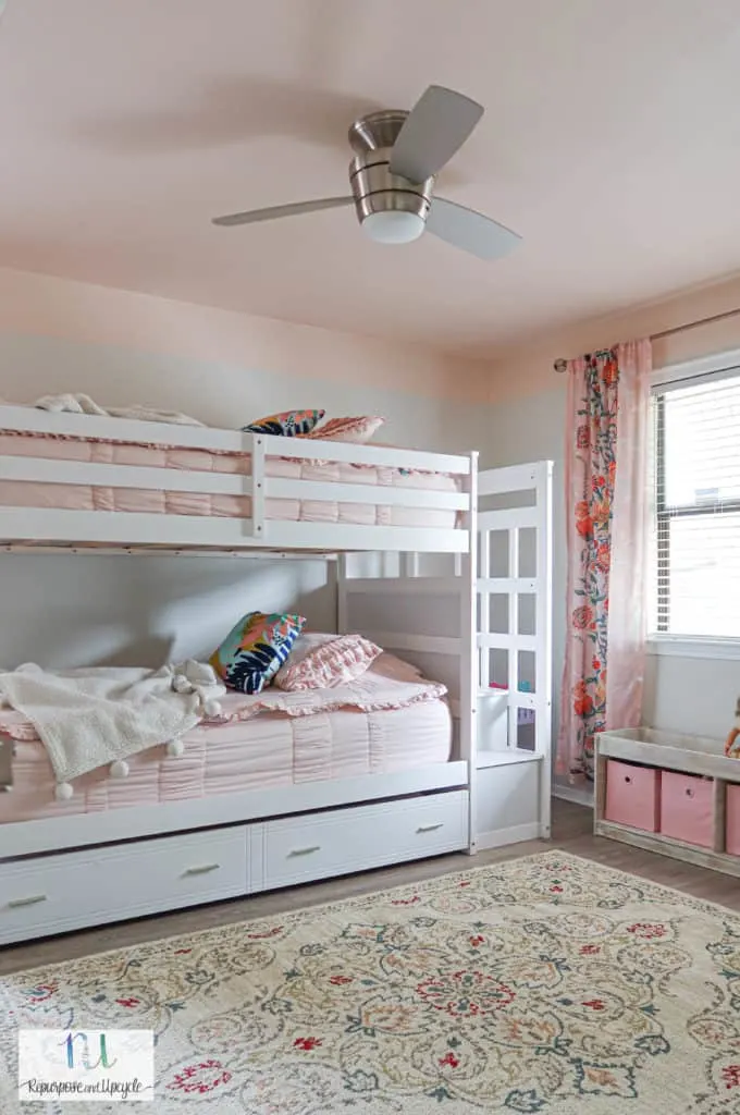 girls bedroom makeover with a pink ceiling and green accents