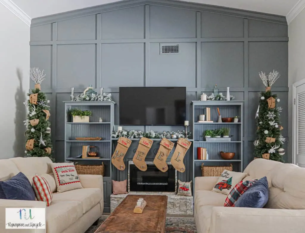 Rustic Christmas Home Tour with tone on tone blue feature wall and electric fireplace hearth