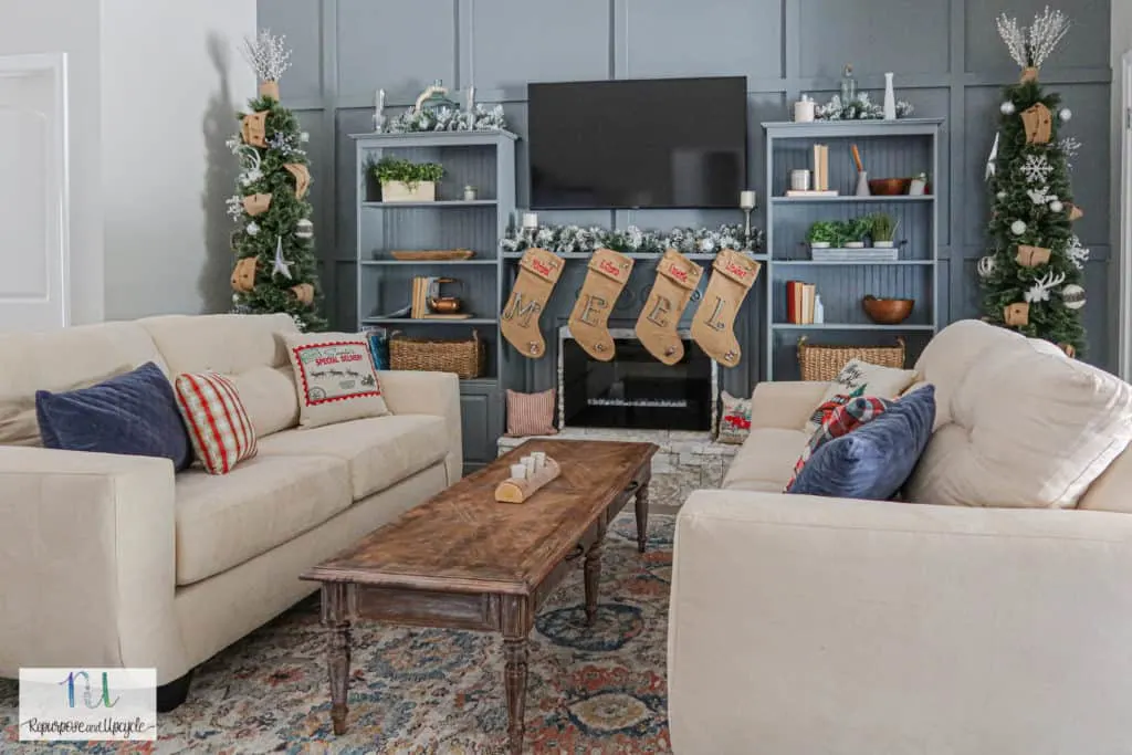 Rustic Christmas Home Tour with tone on tone blue feature wall and electric fireplace hearth