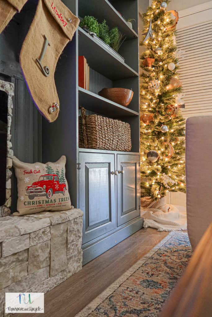 Christmas home tour with tone on tone feature wall and raised electric fireplace hearth