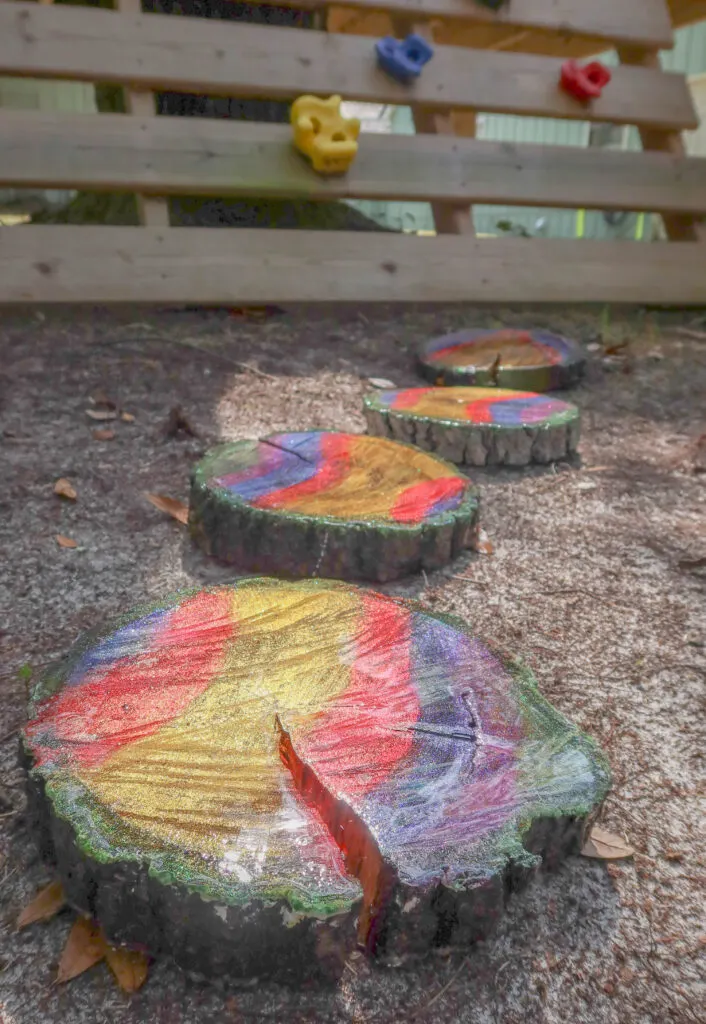 painted tree slices for stepping stones