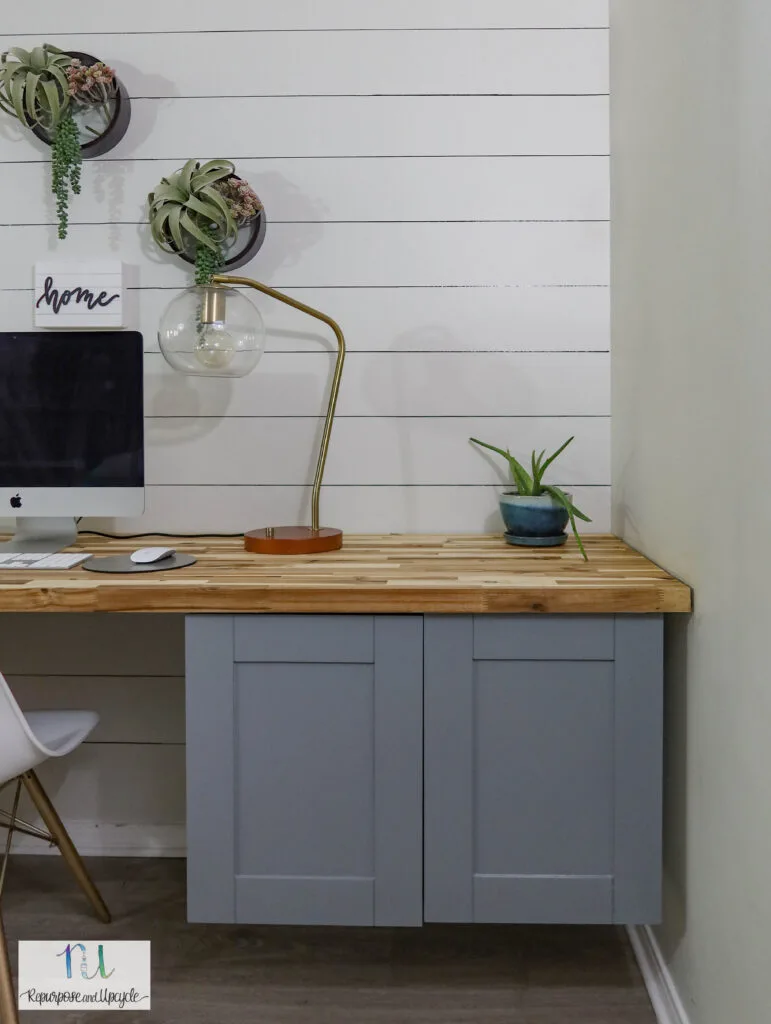 DIY floating desk from upper cabinets and butcher block