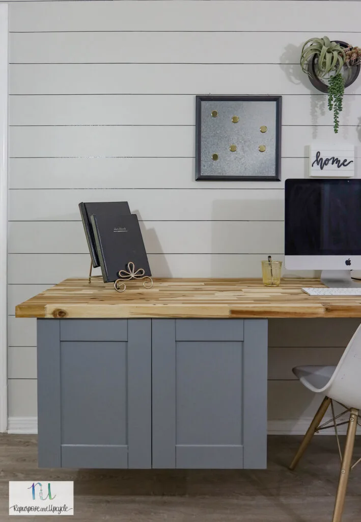DIY floating desk from upper cabinets and butcher block