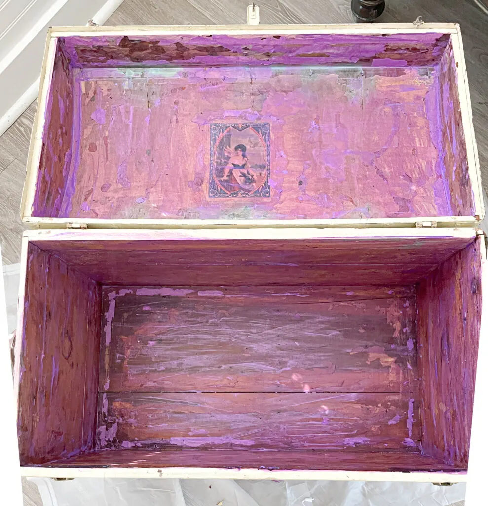 inside of steamer trunk with decoupage and Unicorn Spit