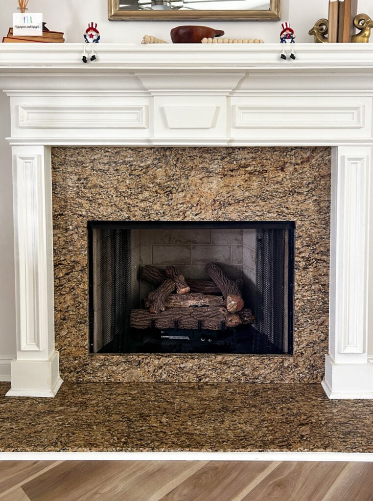 fireplace before peel and stick tile